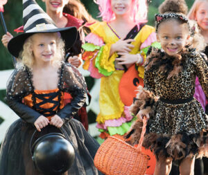kids dressed up in Halloween costumes