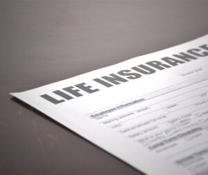 paper that says 'life insurance' at the top