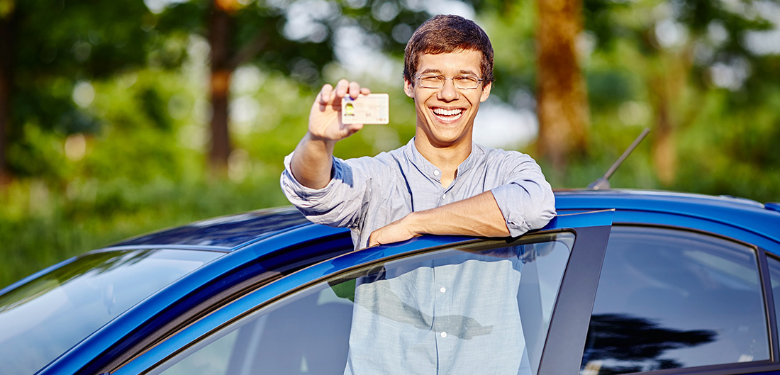 a teen with his driver's license