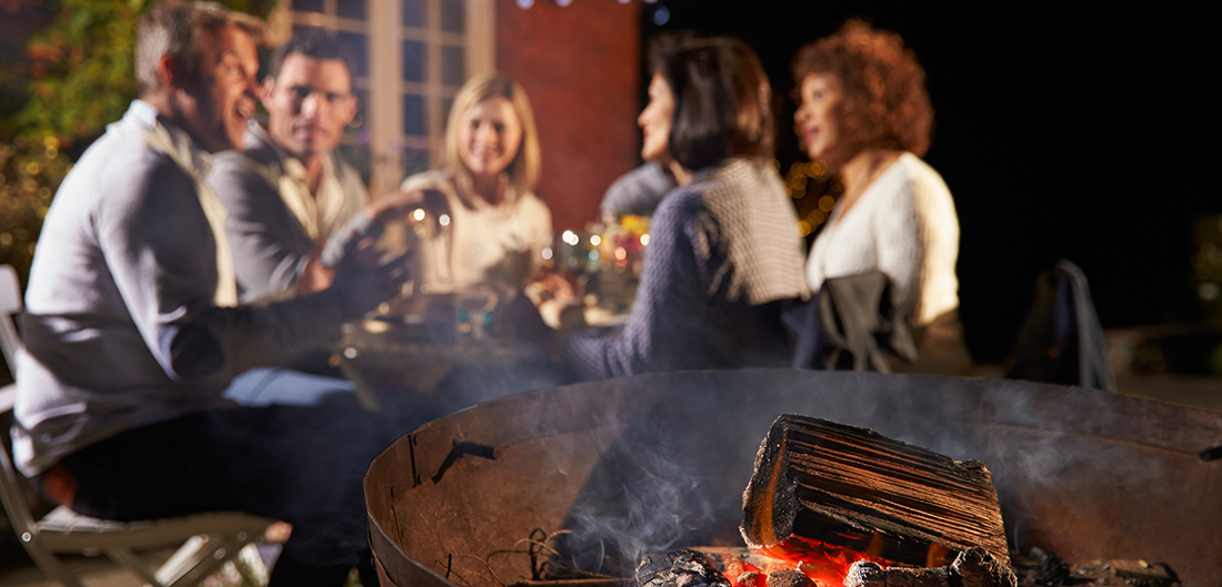 Dinner party near fire pit